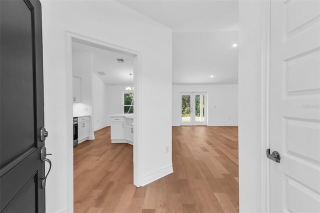 27471 Deep Creek Blvd, Punta Gorda, FL 33983 - hallway featuring light wood-type flooring and recessed lighting