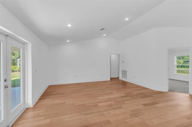 27471 Deep Creek Blvd, Punta Gorda, FL 33983 - spare room with healthy amount of natural light, light wood finished floors, lofted ceiling, and recessed lighting