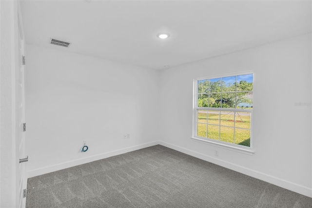 27471 Deep Creek Blvd, Punta Gorda, FL 33983 - carpeted spare room with baseboards and recessed lighting
