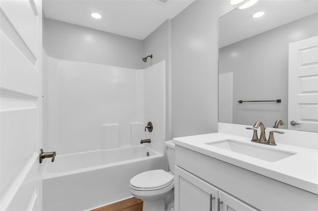 27471 Deep Creek Blvd, Punta Gorda, FL 33983 - full bath featuring vanity, shower / bath combination, recessed lighting, and wood finished floors