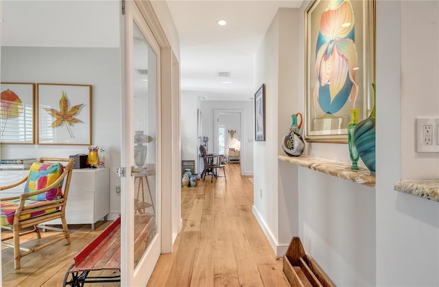 6308 4th Ave NW, Bradenton, FL 34209 - hall featuring light wood-style floors and recessed lighting