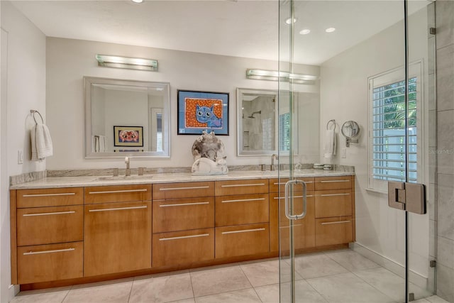 6308 4th Ave NW, Bradenton, FL 34209 - bathroom featuring double vanity, a stall shower, tile patterned flooring, and recessed lighting