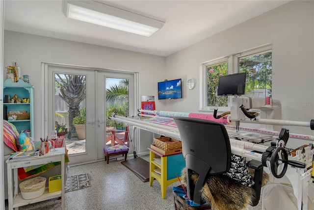 6308 4th Ave NW, Bradenton, FL 34209 - office area featuring french doors, plenty of natural light, and speckle patterned floor