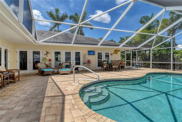6308 4th Ave NW, Bradenton, FL 34209 - swimming pool featuring french doors, a patio, and a lanai
