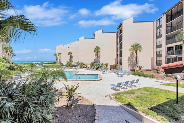 6480 Midnight Pass Rd Unit 211, Sarasota, FL 34242 - community pool with a patio