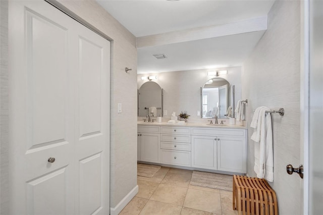 6480 Midnight Pass Rd Unit 211, Sarasota, FL 34242 - bathroom with double vanity and tile patterned floors