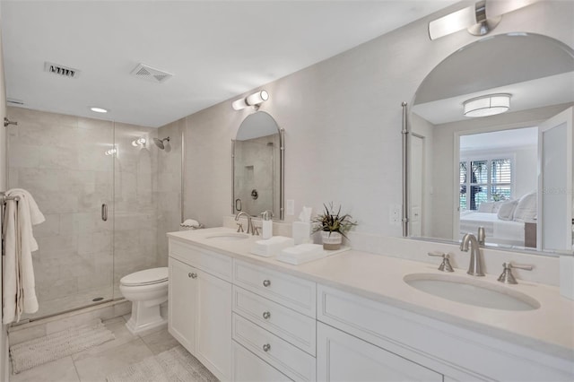 6480 Midnight Pass Rd Unit 211, Sarasota, FL 34242 - full bath featuring double vanity, a shower stall, ensuite bath, and tile patterned flooring