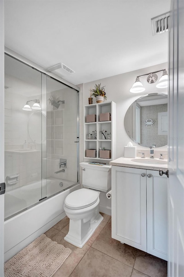 6480 Midnight Pass Rd Unit 211, Sarasota, FL 34242 - full bathroom featuring tile patterned flooring, bath / shower combo with glass door, and vanity