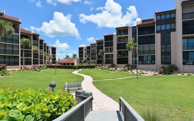 6480 Midnight Pass Rd Unit 211, Sarasota, FL 34242 - view of community with a lawn