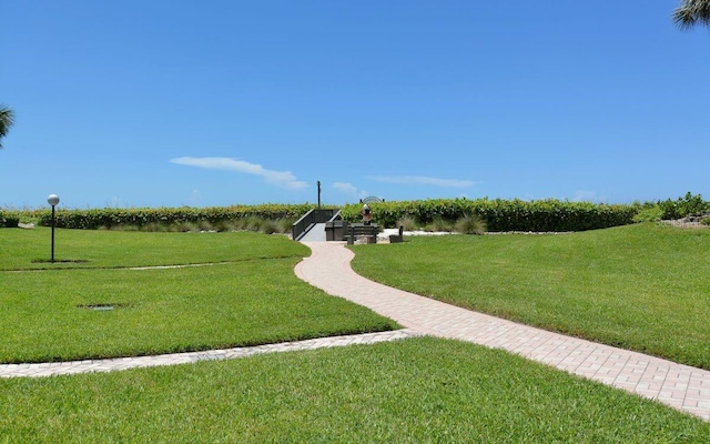 6480 Midnight Pass Rd Unit 211, Sarasota, FL 34242 - view of property's community featuring a lawn