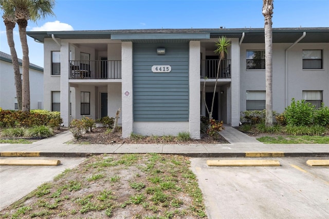 4415 45th Ave W Unit 102, Bradenton, FL 34210 - view of property with uncovered parking