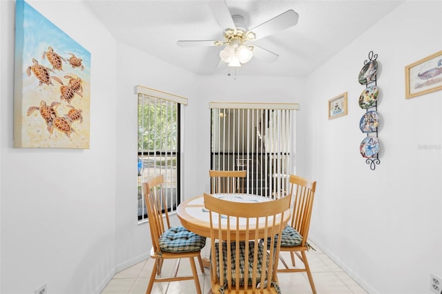 4415 45th Ave W Unit 102, Bradenton, FL 34210 - dining room with ceiling fan and light tile patterned floors