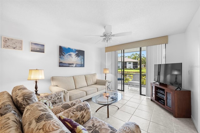 4415 45th Ave W Unit 102, Bradenton, FL 34210 - living room with a ceiling fan and light tile patterned flooring