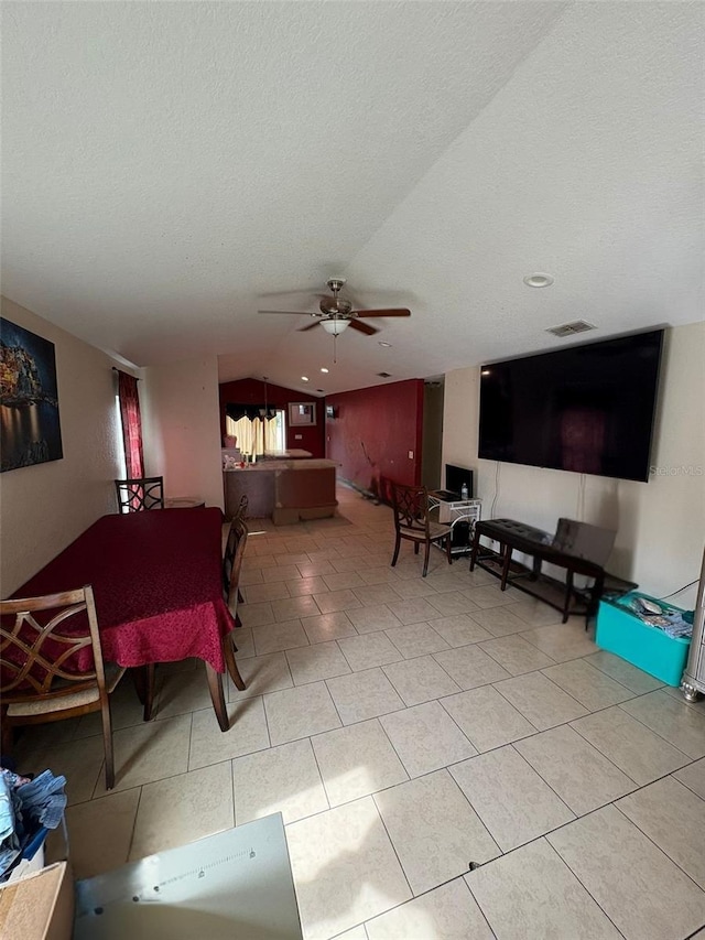 712 W Myrtle St, Lakeland, FL 33815 - dining area with lofted ceiling, ceiling fan, and light tile patterned floors