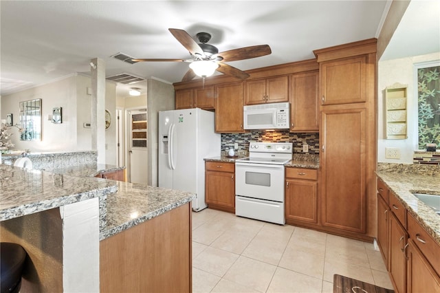 8606 Gold Pine Dr, Port Richey, FL 34668 - kitchen with white appliances, brown cabinets, a ceiling fan, light stone counters, and decorative backsplash