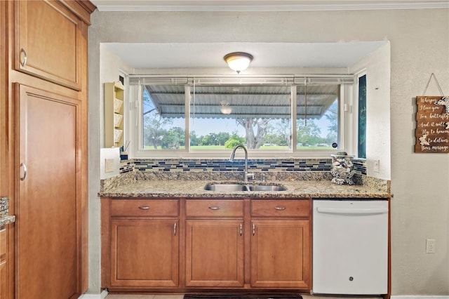 8606 Gold Pine Dr, Port Richey, FL 34668 - kitchen with dishwasher, brown cabinets, light stone counters, decorative backsplash, and ornamental molding