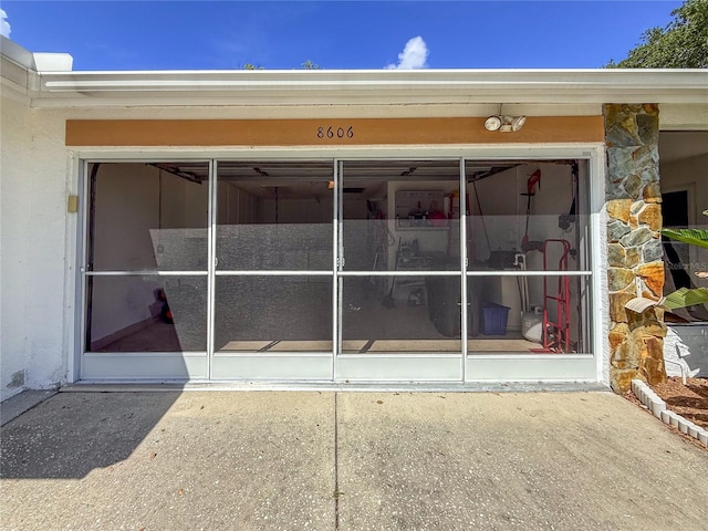 8606 Gold Pine Dr, Port Richey, FL 34668 - entrance to property with stone siding