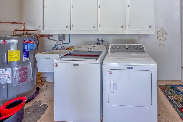 8606 Gold Pine Dr, Port Richey, FL 34668 - washroom featuring electric water heater, washer and clothes dryer, and cabinet space