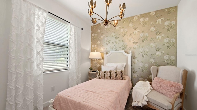 15992 Honey Suckle St, Port Charlotte, FL 33953 - bedroom with multiple windows and a chandelier