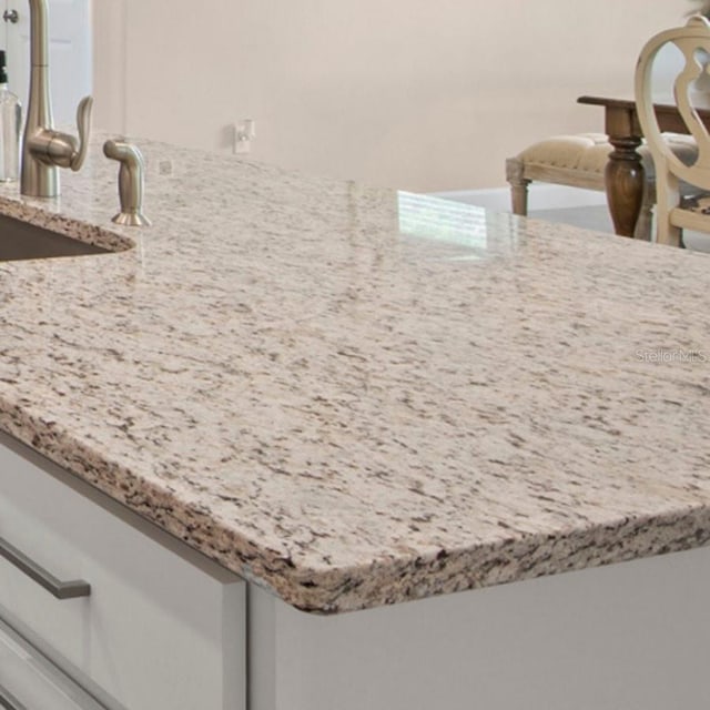 15992 Honey Suckle St, Port Charlotte, FL 33953 - detailed view of light stone counters
