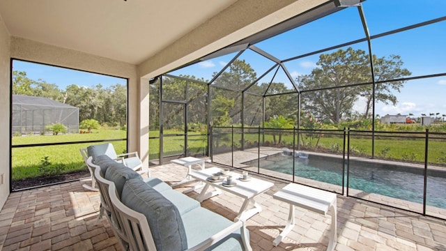 15992 Honey Suckle St, Port Charlotte, FL 33953 - view of patio / terrace featuring a lanai, an outdoor pool, and outdoor lounge area