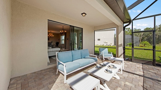15992 Honey Suckle St, Port Charlotte, FL 33953 - sunroom / solarium featuring an outdoor living space and a chandelier