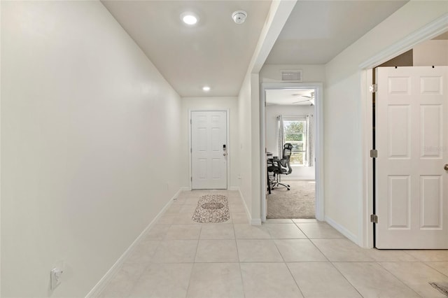24748 Rio Villa Lakes Cir, Punta Gorda, FL 33950 - hallway featuring light tile patterned floors and recessed lighting