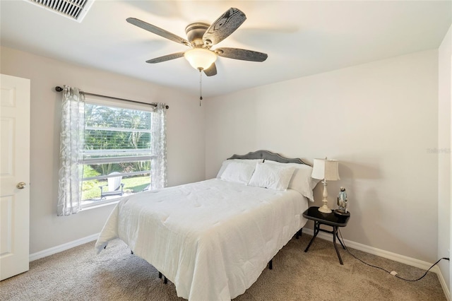 24748 Rio Villa Lakes Cir, Punta Gorda, FL 33950 - carpeted bedroom featuring baseboards and a ceiling fan