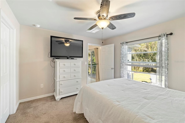24748 Rio Villa Lakes Cir, Punta Gorda, FL 33950 - bedroom featuring light colored carpet and ceiling fan
