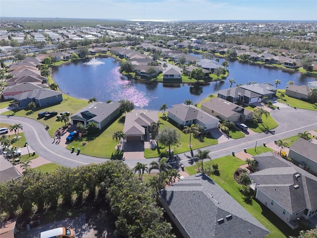 24748 Rio Villa Lakes Cir, Punta Gorda, FL 33950 - aerial view of property and surrounding area with nearby suburban area and a large body of water