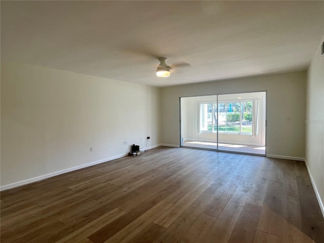 6300 Flotilla Dr Unit 71, Holmes Beach, FL 34217 - unfurnished room with dark wood finished floors and a ceiling fan