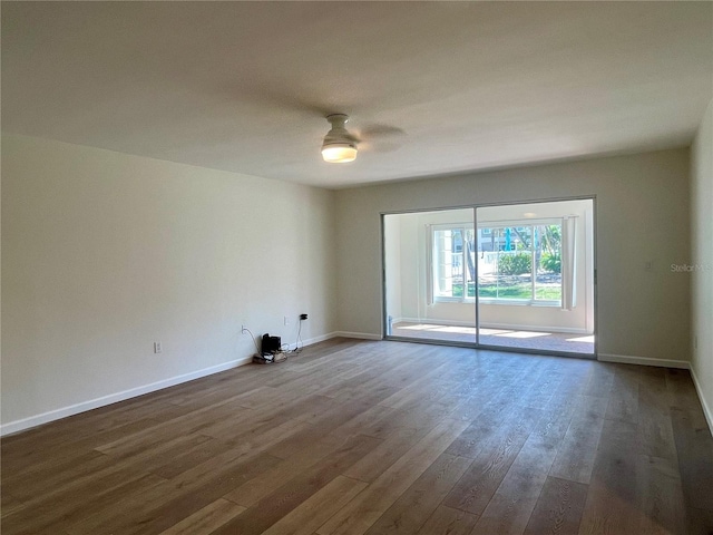 6300 Flotilla Dr Unit 71, Holmes Beach, FL 34217 - unfurnished room featuring dark wood-type flooring and ceiling fan