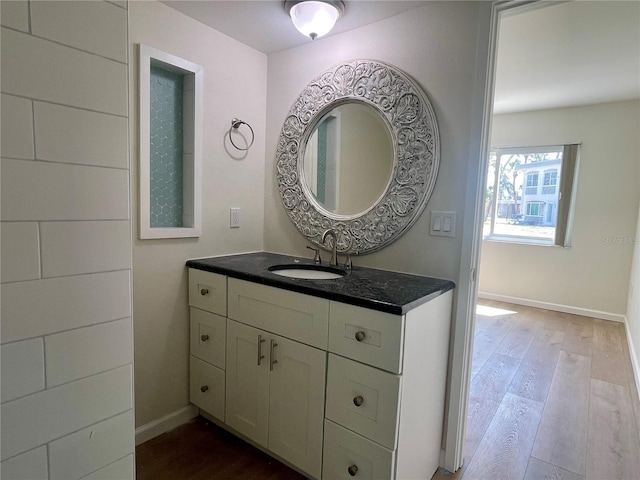 6300 Flotilla Dr Unit 71, Holmes Beach, FL 34217 - bathroom with wood finished floors and vanity