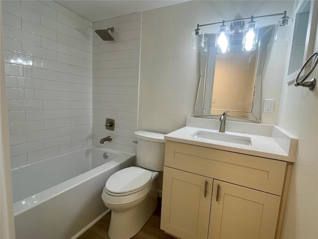 6300 Flotilla Dr Unit 71, Holmes Beach, FL 34217 - bathroom with vanity, shower / washtub combination, a textured wall, and wood finished floors