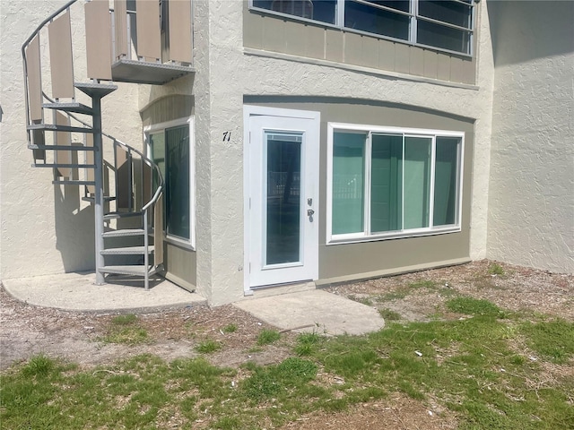6300 Flotilla Dr Unit 71, Holmes Beach, FL 34217 - entrance to property with stucco siding