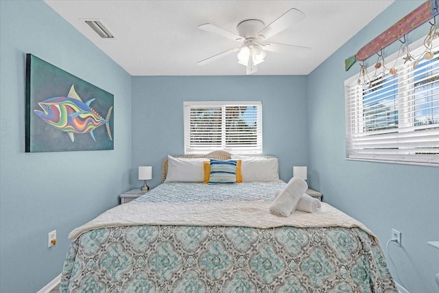 201 75th St Unit A, Holmes Beach, FL 34217 - bedroom featuring multiple windows and ceiling fan