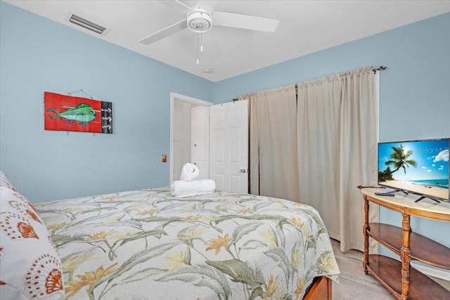 201 75th St Unit A, Holmes Beach, FL 34217 - bedroom featuring light wood-type flooring and ceiling fan