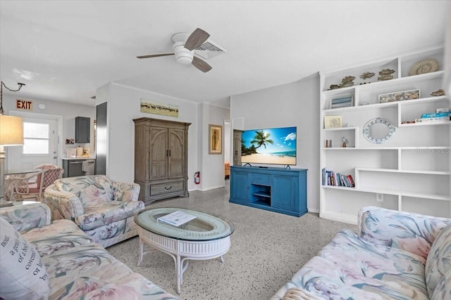 201 75th St Unit A, Holmes Beach, FL 34217 - living area with ceiling fan and speckled floor