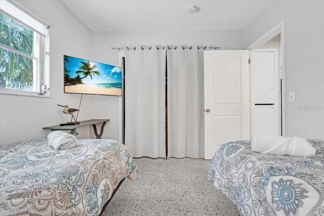 201 75th St Unit A, Holmes Beach, FL 34217 - bedroom with speckle patterned floor