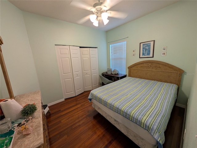 2641 73rd Ct W Unit 124, Bradenton, FL 34209 - bedroom featuring dark wood-type flooring, a closet, and a ceiling fan