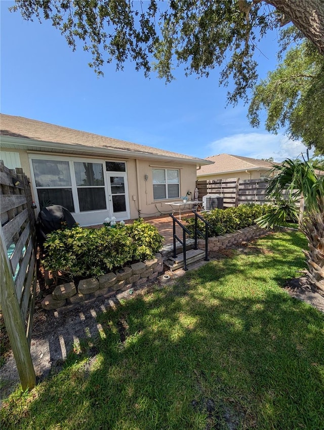 2641 73rd Ct W Unit 124, Bradenton, FL 34209 - back of property featuring stucco siding