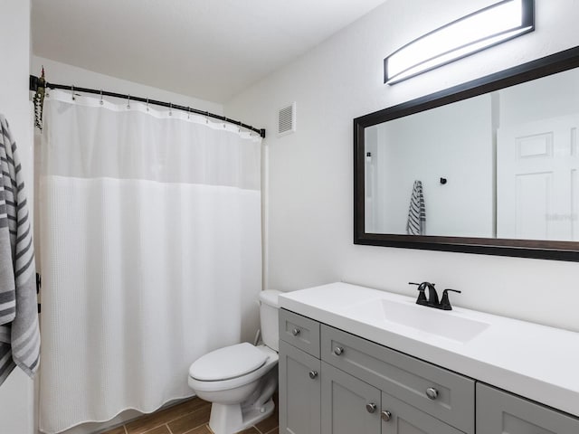 7424 Vista Way Unit 104, Bradenton, FL 34202 - bathroom featuring vanity and wood finished floors
