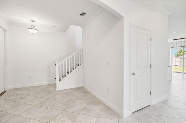 9629 Ivory Dr, Ruskin, FL 33573 - stairs featuring tile patterned floors and crown molding