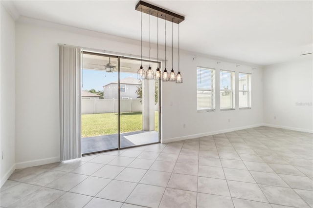 9629 Ivory Dr, Ruskin, FL 33573 - unfurnished dining area with baseboards and light tile patterned flooring