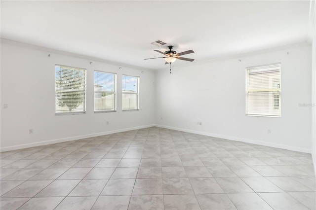 9629 Ivory Dr, Ruskin, FL 33573 - empty room with ceiling fan and light tile patterned floors