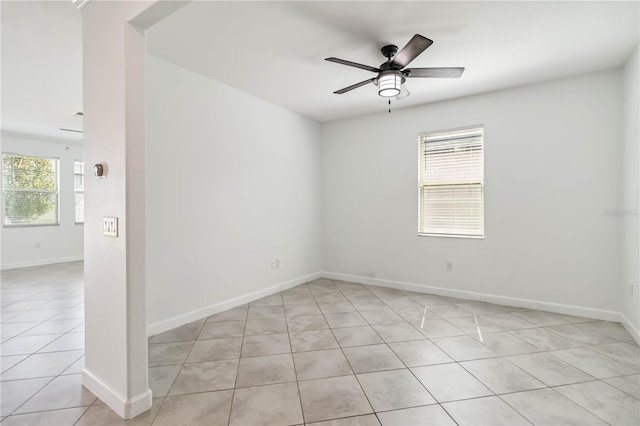 9629 Ivory Dr, Ruskin, FL 33573 - spare room with light tile patterned floors, healthy amount of natural light, and a ceiling fan