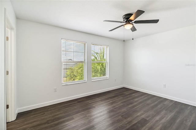 9629 Ivory Dr, Ruskin, FL 33573 - unfurnished room with dark wood-style floors and ceiling fan