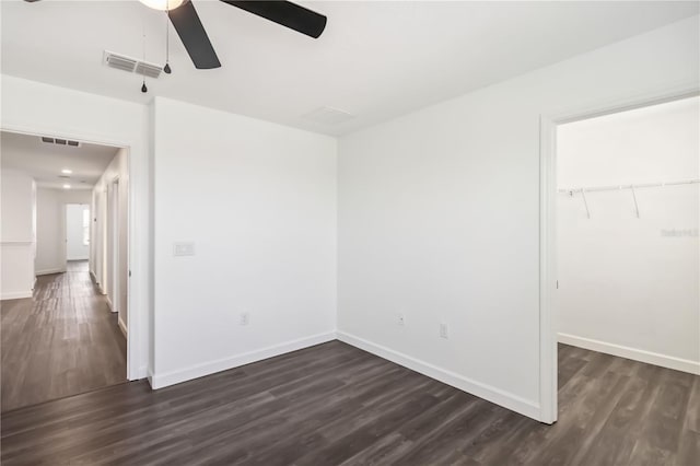 9629 Ivory Dr, Ruskin, FL 33573 - empty room with ceiling fan and dark wood finished floors