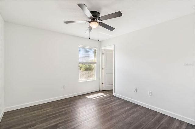 9629 Ivory Dr, Ruskin, FL 33573 - unfurnished room featuring dark wood-style floors and ceiling fan