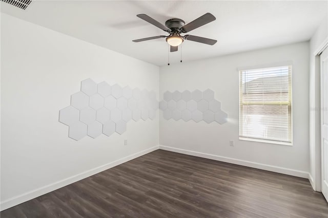 9629 Ivory Dr, Ruskin, FL 33573 - empty room featuring a ceiling fan and dark wood-style flooring